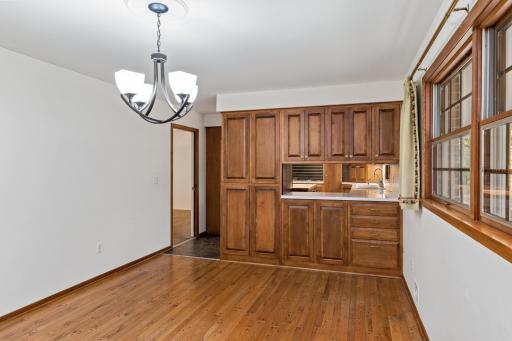 Follow the oak floors through the dinette and kitchen areas.
