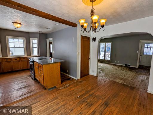 Photo for 245 Merriam Avenue N, Thief River Falls, MN 56701 - Listing #6314038 Dining room kitchen with hardwood floors.jpg