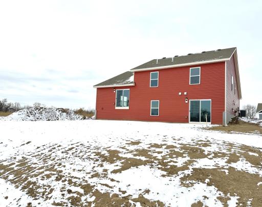 7954 Marquette features a finished, walkout basement and backs up to a pond for amazing views and back yard privacy. Picture is of actual home and homesite.