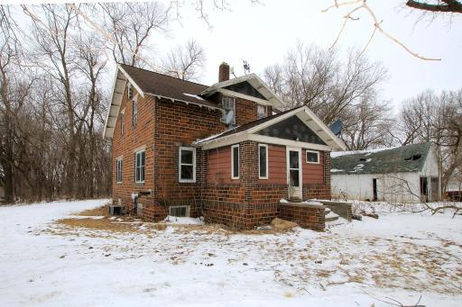 Brick one 1/2 story country home with so much potential! 4 bedroom, 1 1/2 bath home, hardwood floors throughout, laundry chute and walk-up attic.