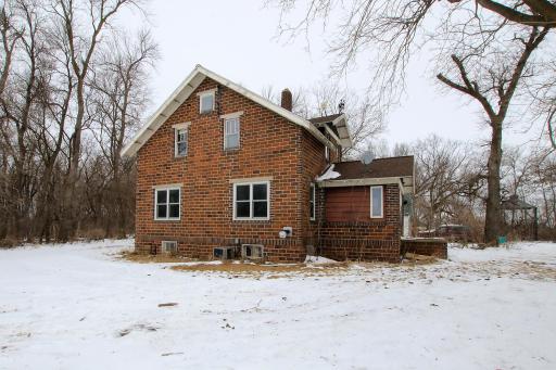 Brick one 1/2 story country home with so much potential! 4 bedroom, 1 1/2 bath home, hardwood floors throughout, laundry chute and walk-up attic.