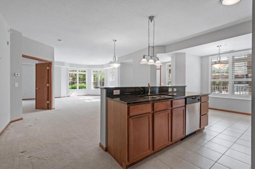 The open concept of this home make it perfect for entertaining. The kitchen features both an eat-in kitchen option as well as space for formal dining on the other side of the large kitchen island.