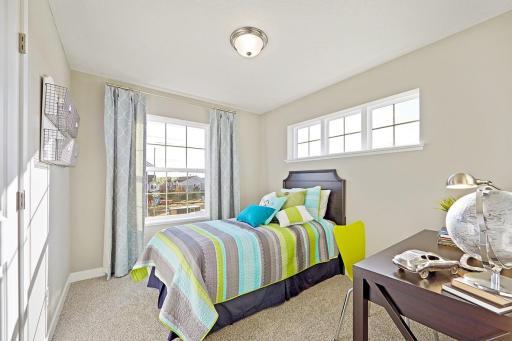 One of 3 bedrooms on the upper level. Photos from previous model home, finishes and options to vary.