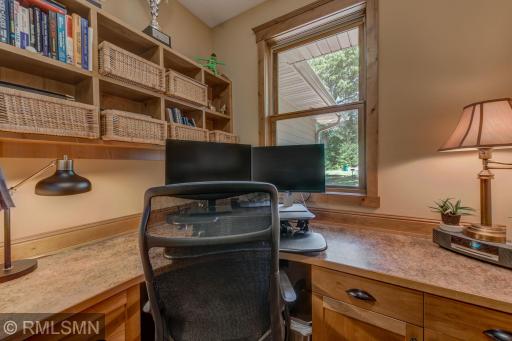 The mud room near the garage entry also has this office nook.