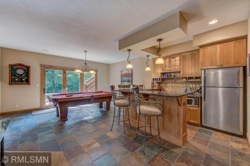 Lower level wet bar is a great place to entertain!