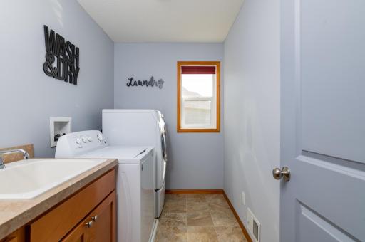 Upper level laundry room with utility sink.jpg