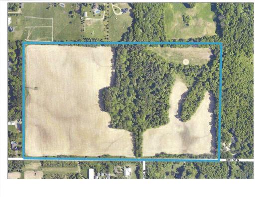 An aerial photo showing the boundaries and the mix of tillable and wooded.