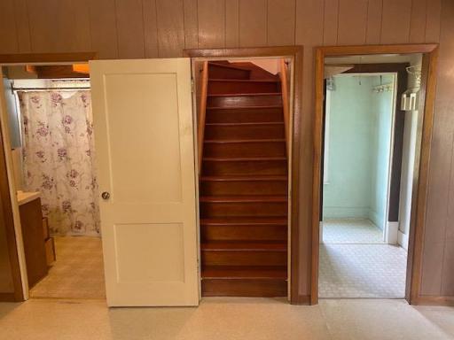 Bathroom-Coat Closet access to upstairs steps