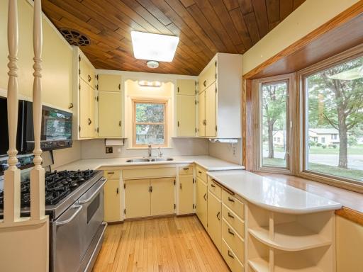 Efficient kitchen with newer appliances and hard surface counters.