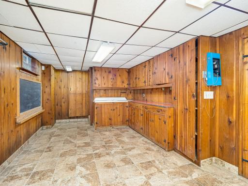 Basement has tile and drop ceiling. Plenty of room for TV, game room, whatever you like.