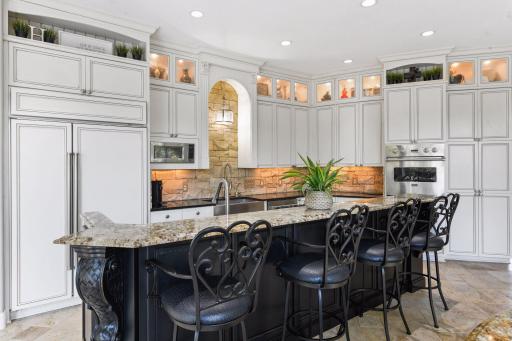 Photo for 1450 W Farm Road, Chaska, MN 55318 - Listing #6113107 A large island provides the perfect workspace for whipping up tasty meals or baking cookies!
