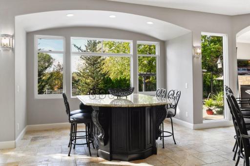 Photo for 1450 W Farm Road, Chaska, MN 55318 - Listing #6113107 Three new windows were added to the dining room filling the space with natural light. The base of the built-in dining table is surrounded with additional storage cabinetry.