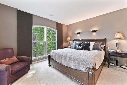 A large walk-in closet with a custom built-in organizer system completes the master suite.