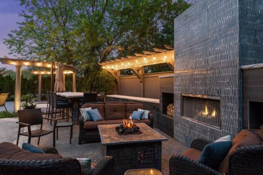 Photo for 1450 W Farm Road, Chaska, MN 55318 - Listing #6113107 The fireplace and high-top table were crafted with imported designer tiles.