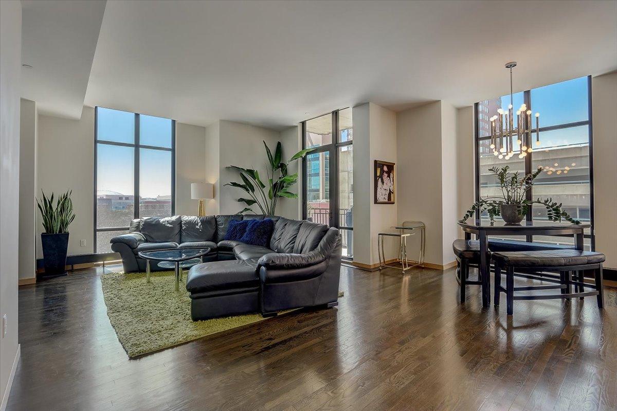 Spectacular downtown corner condominium offering amazing views through the floor to ceiling windows, open floor plan, and so much more in the luxurious Hotel Ivy!