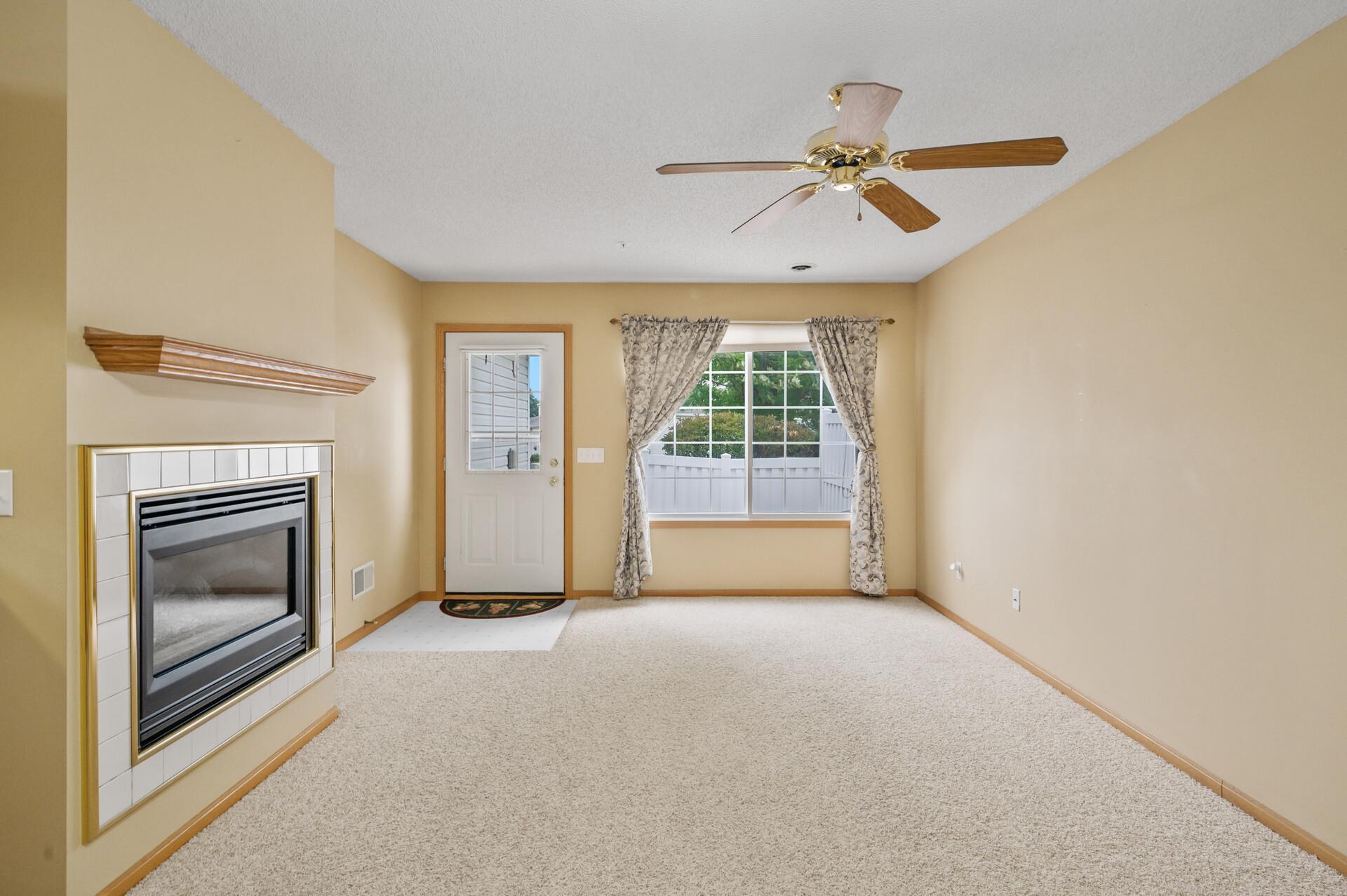 Photo for 13207 Bush Lane, Eden Prairie, MN 55347 - Listing #6428111 Main floor features living room, informal dining room, kitchen, 1/2 bathroom and garage