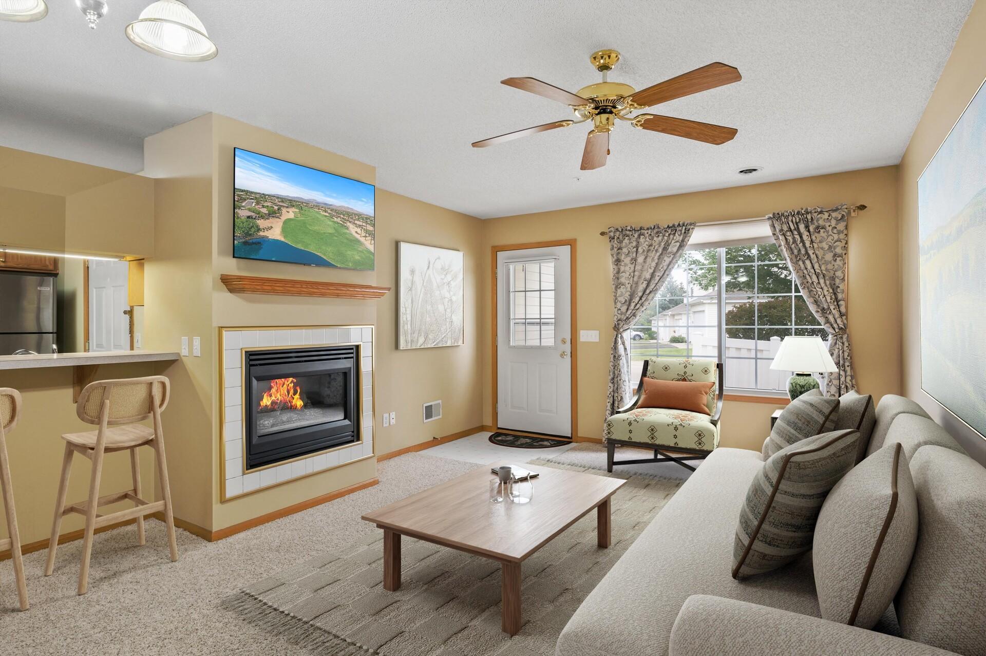 Virtually staged. Cozy gas fireplace will be welcome this winter!