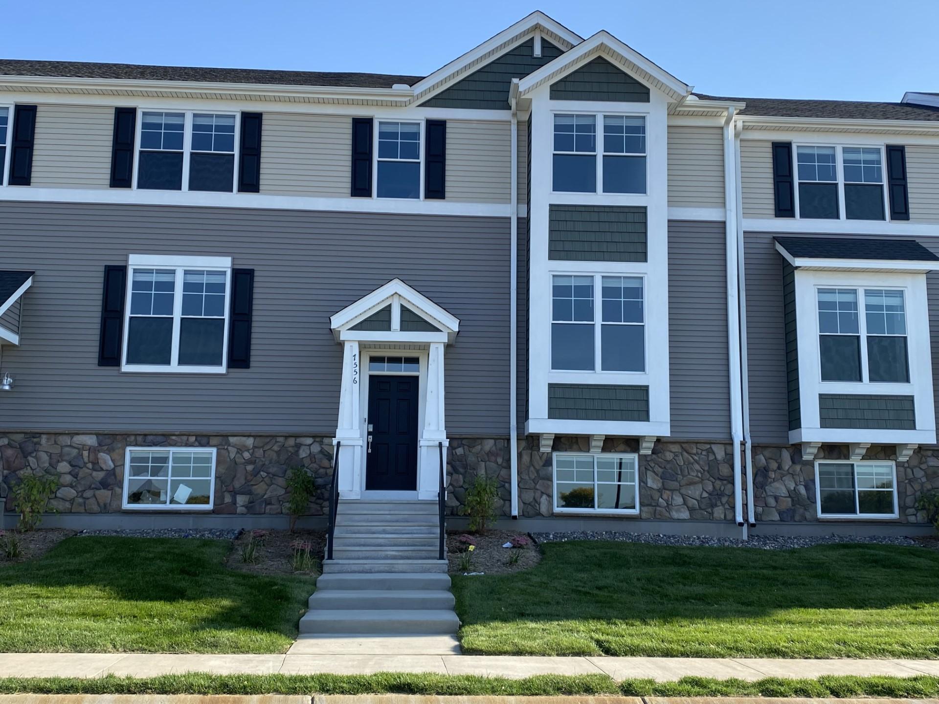 Move-in ready, 3 bedroom townhome in Oakdale's newest community! Upgraded white cabinetry, quartz countertops and slate appliances with a gas range and beautiful view of the wetland!