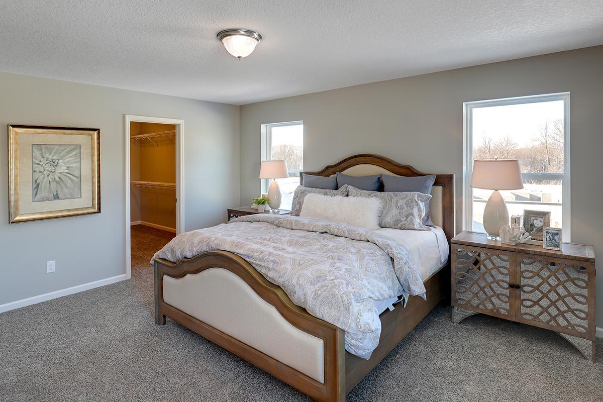 An oasis on it's own, the home's primary suite is awesome and loaded - including immediate access to a MASSIVE walk-in closet as well as a private bath that is equally appointed with features. Photo of model, colors and options will vary.