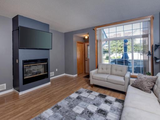 Notice the nice entry, large windows, gas fireplace and updated colors that set this home apart!
