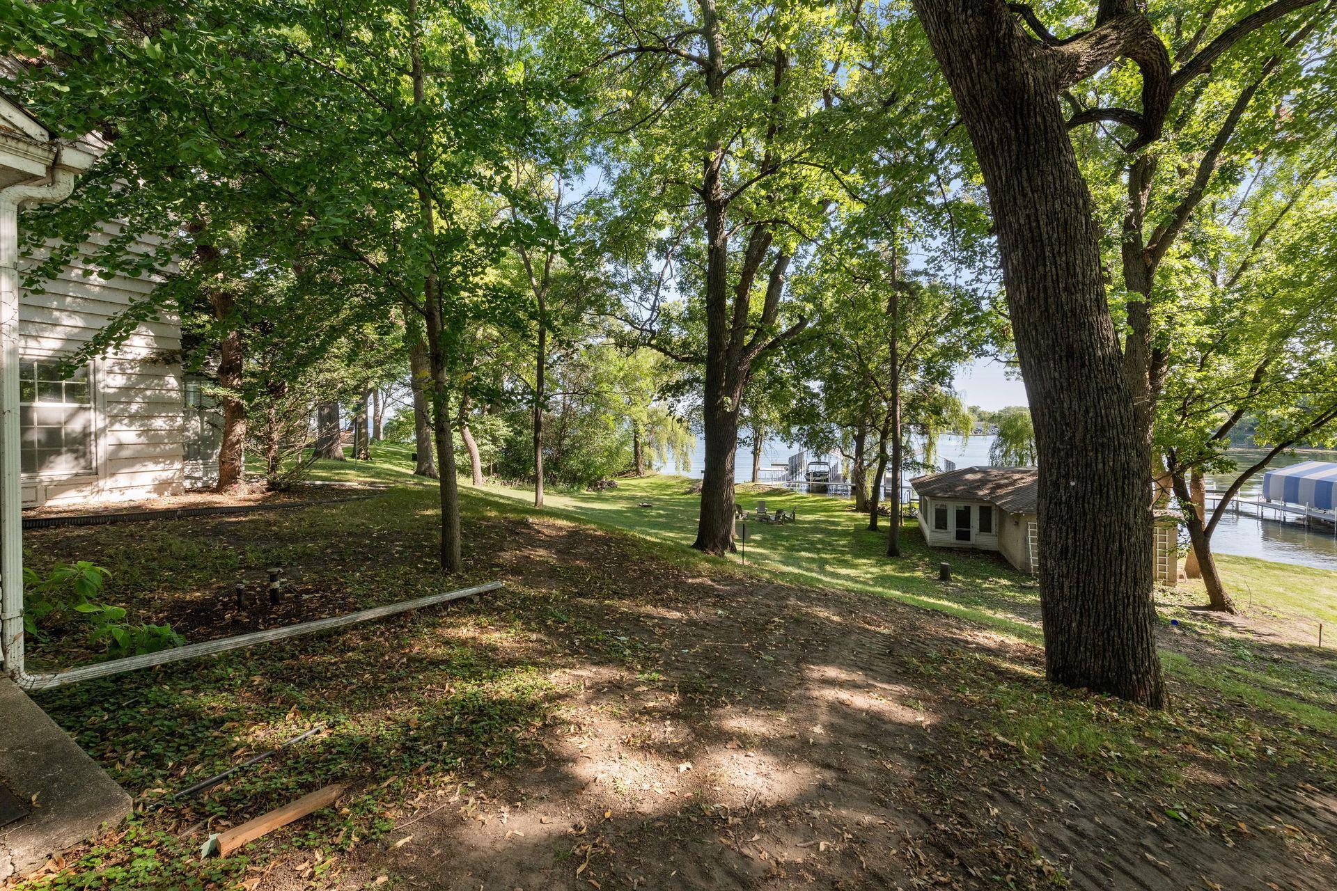 Trees and brush have been removed/cleaned up since these photos