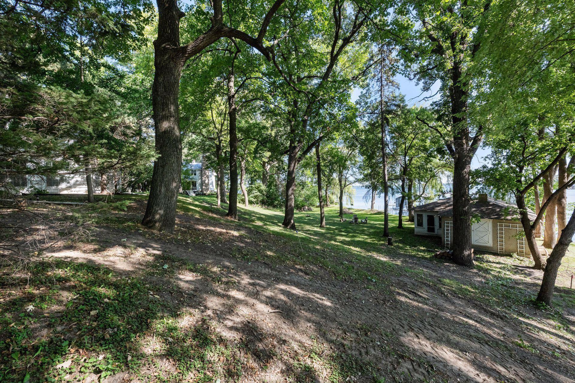 Trees and brush have been removed/cleaned up since these photos