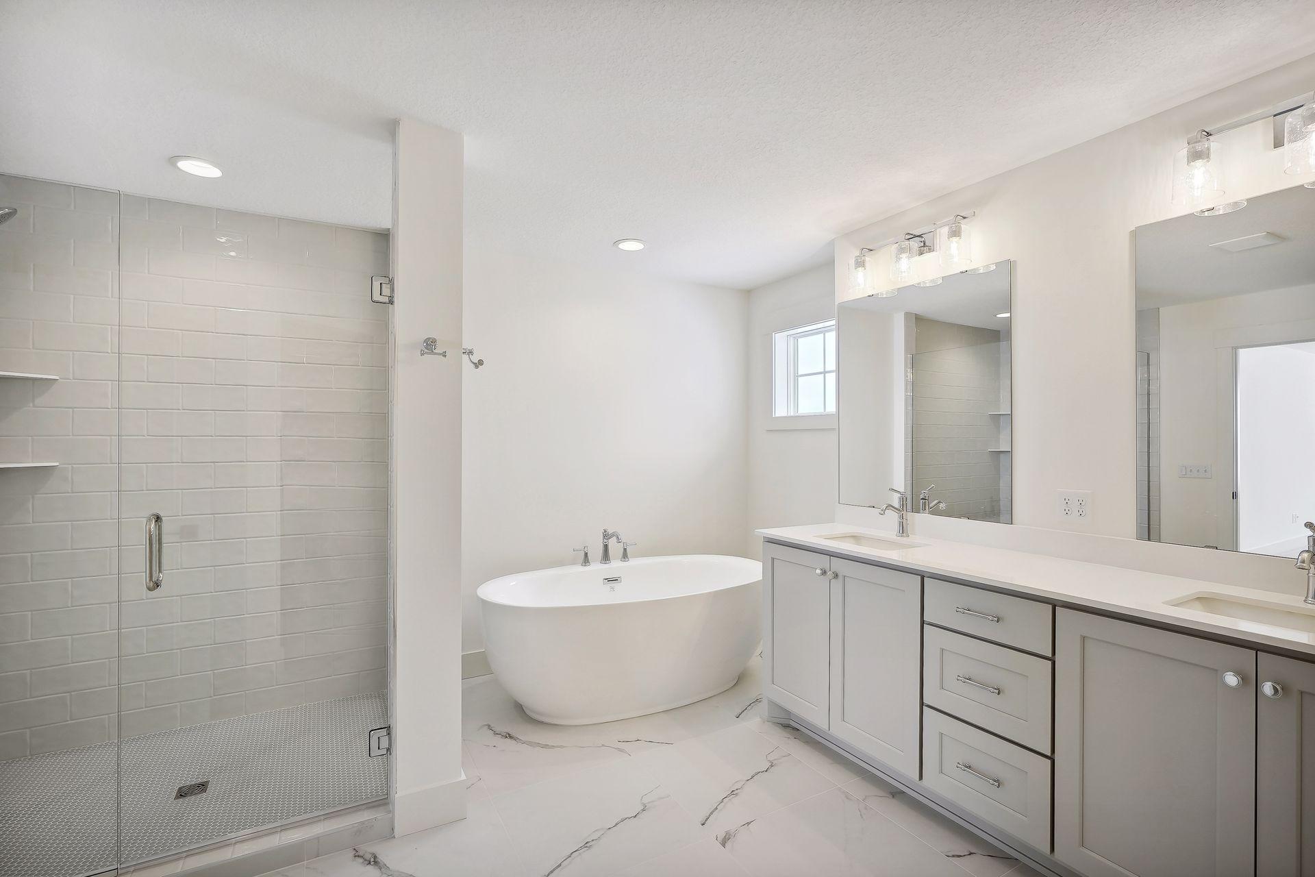 Beautiful finishes in Owner's bathroom with soaking tub
