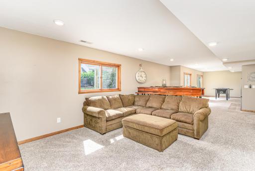 Spacious family room and recreation room in lower level