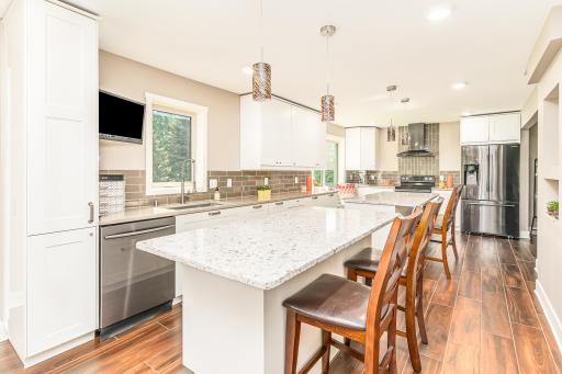 Abundant cabinetry, double oven, & soft close drawers await you!