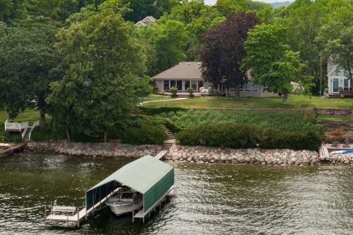 Welcome to 205 West Point Road in the heart of beautiful Tonka Bay.
