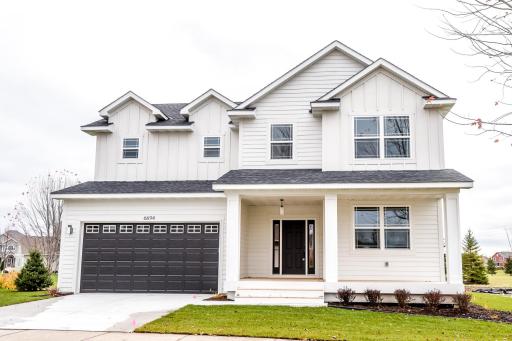 Welcome home to your very own custom built home in the heart of Towne Lakes! Photo is of previously built home of the same plan. Actual home will have a slightly different exterior design (and black windows!).