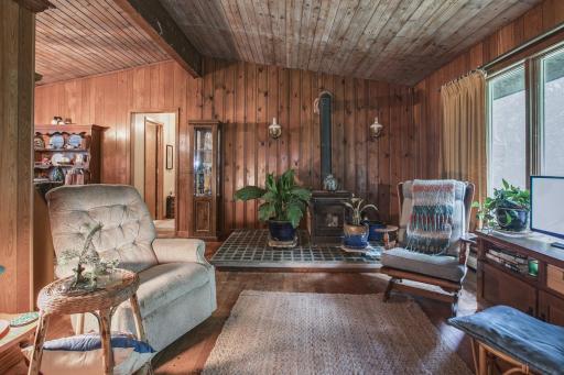 Original hand-scraped wood walls/ceiling.