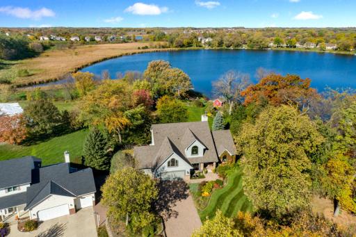 Custom built lake home with ideal floor plan and beautiful lakeshore to boat, fish, swim, waterski and more!