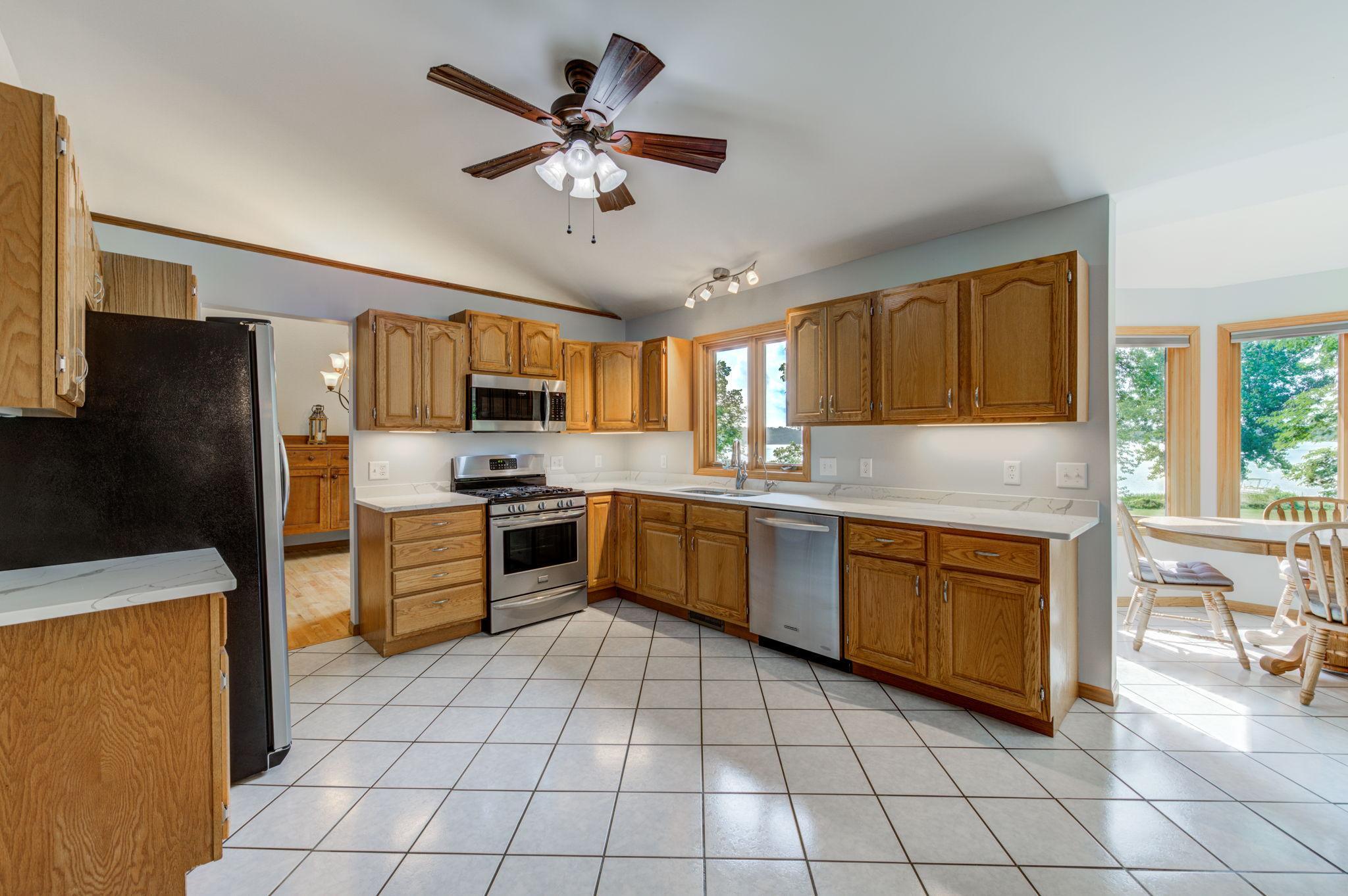 With stainless steel appliances and the window overlooking the lake, you will enjoy preparing meals and entertaining in this kitchen!