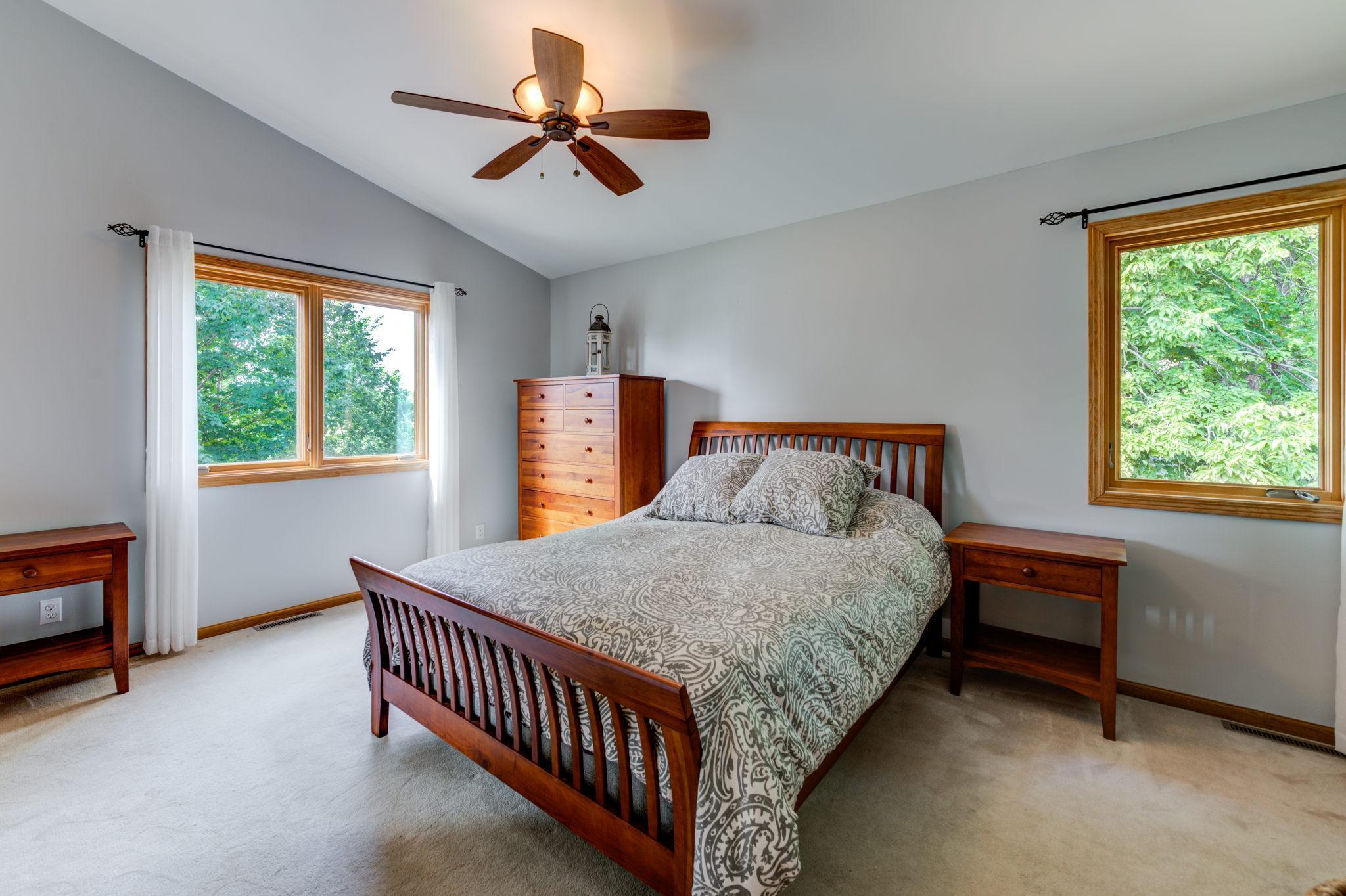 Your master bedroom offers plenty of space and has an oversized window looking out towards French Lake!