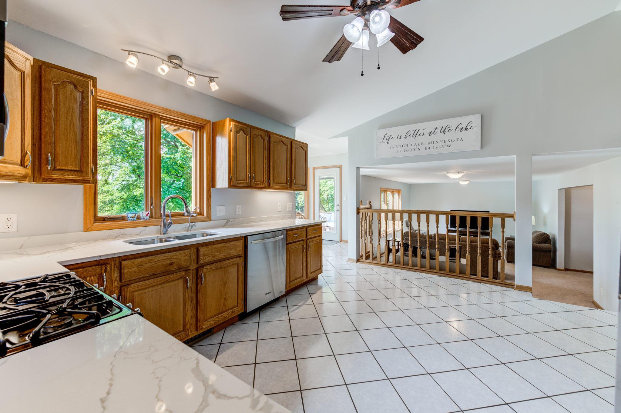 This spacious kitchen features tile floors, granite countertops and plenty of prep/storage space. This great location is less than 4 miles to town for shopping, schools and entertainment.