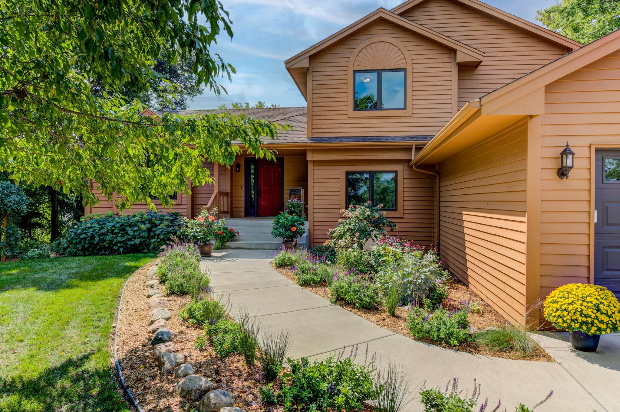 You will fall in love with the perennial gardens and landscaping surrounding this home. The pride of ownership is apparent!
