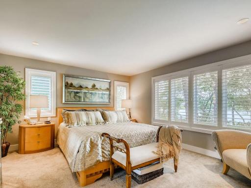 Main floor master bedroom with gorgeous views of the lake!