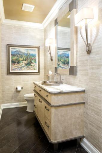 Pretty powder bath located off the foyer