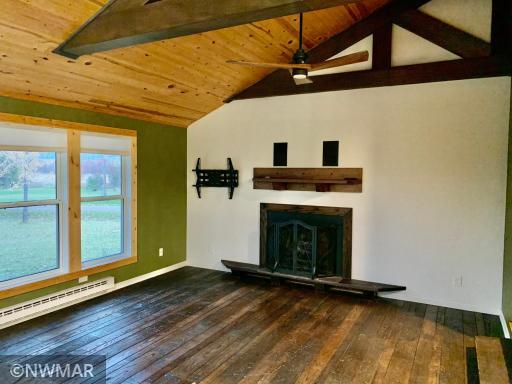 Main level living room with fireplace