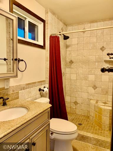 Master bath with tiled walk in shower