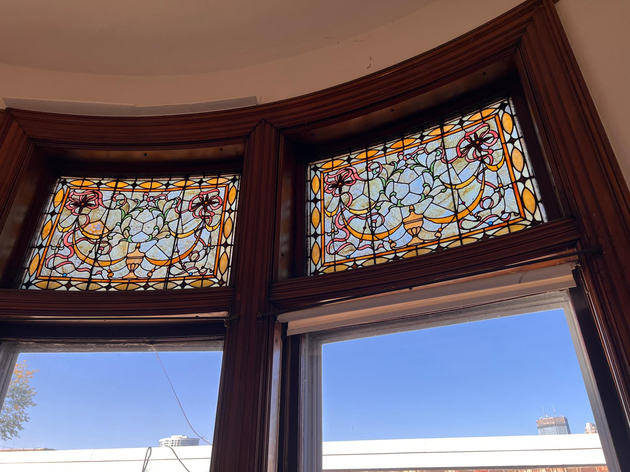 Photo for 1920 Stevens Avenue, Minneapolis, MN 55403 - Listing #6435233 1920 Stained glass windows in stairwell.jpg