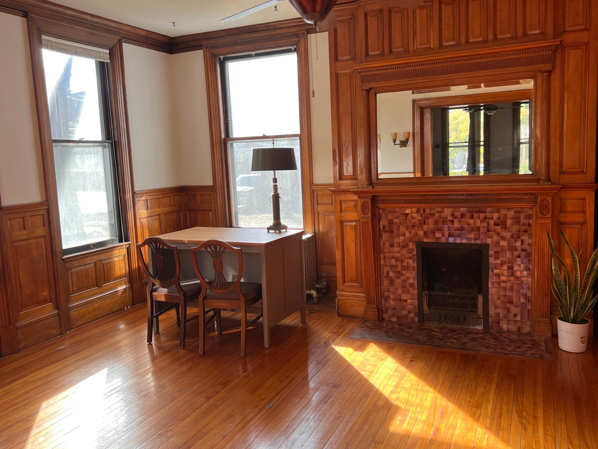 1920 Stevens Avenue- Main floor 2 bed-Dining room with second fireplace.jpg