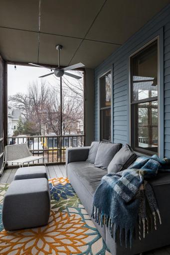 Upper level screened in porch overlooks 34th Street