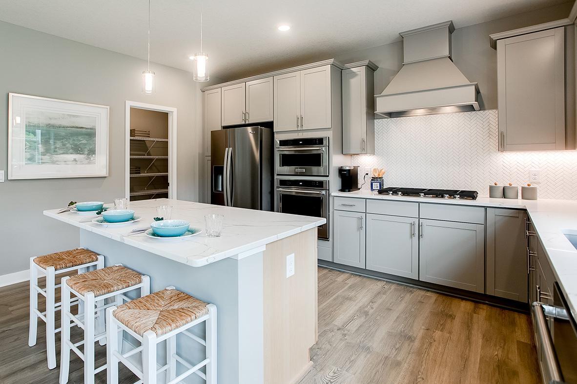 Built to perform, not even a single element was missed. Stunning stainless steel appliances (as seen here), Granite coated countertops (including the massive island) and an extra-deep pantry! What time is dinner!?