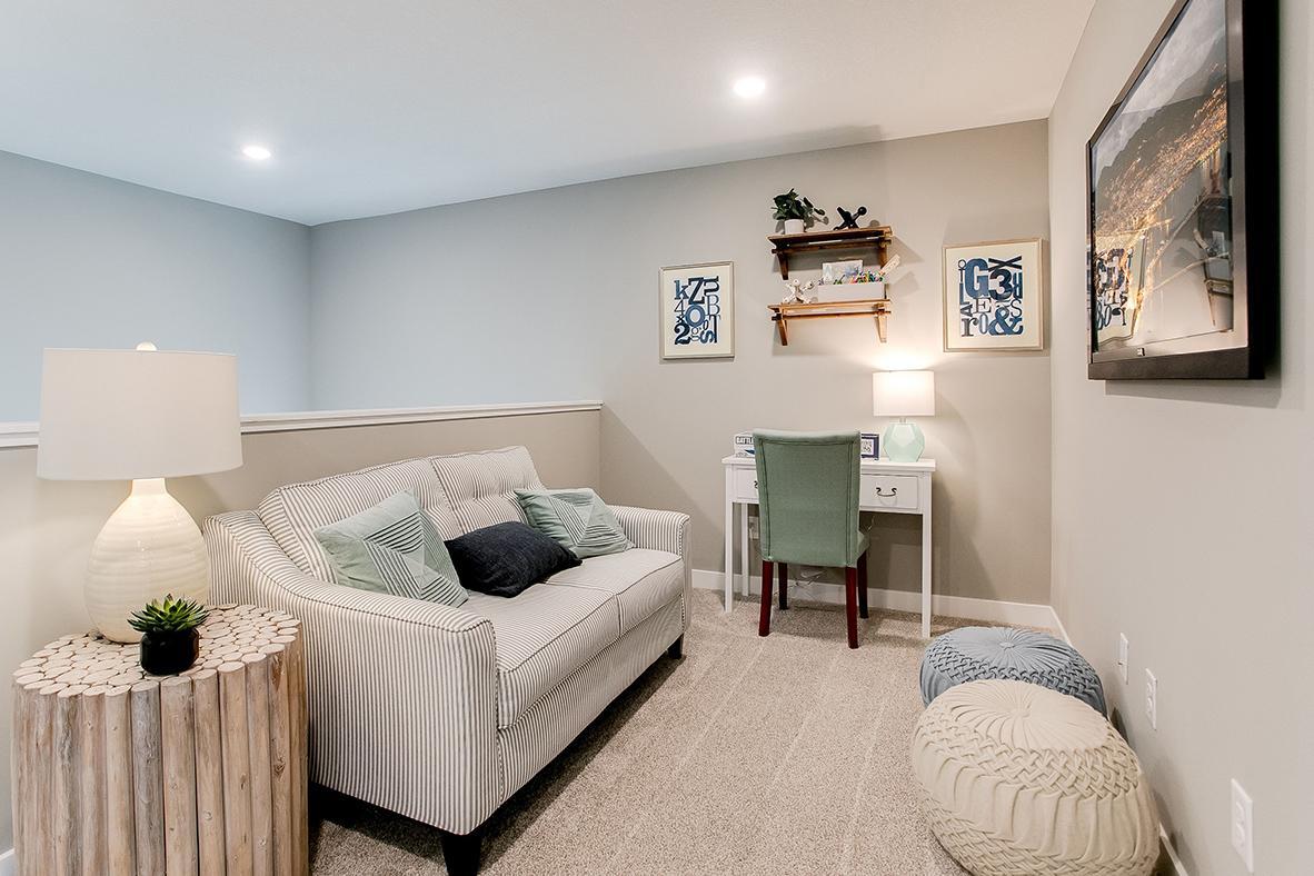 Once upstairs, the entire level flows from the focal point offered by this huge loft space. Sure to become a family favorite hangout spot, the room is just steps from each of the home's five upper level bedrooms!