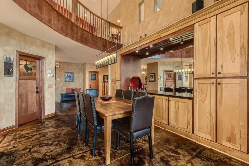 Dining area off the kitchen ahs a beautiful blt in buffet with tons of cabinets for setting up and a wine cellar room for your private collection of wines. Unfortunately the wines are not included in the sale of the home :)