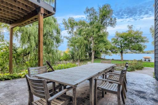 Now for the outside entertaining areas. This stamped concrete patio area you can get to from the family room, and the owners suite
