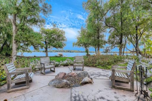 2nd area is the beautiful stamped concrete firepit area. Imagine a great fire while taking in the lake views