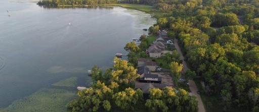 This home sits on a dead end dirt road. Very very private location Does have city sewer but the home has a well